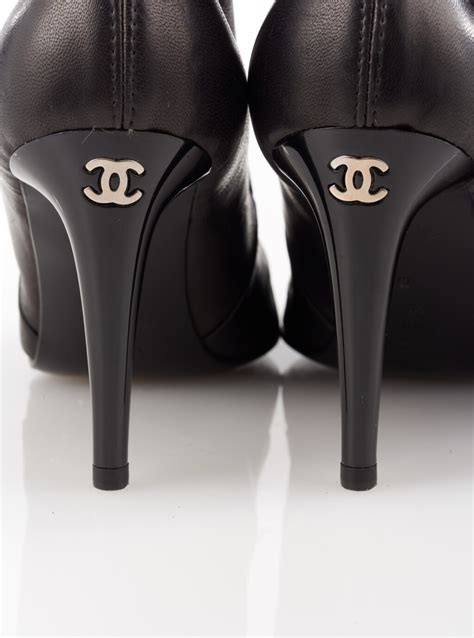 chanel riding boots black|Chanel high heel boots.